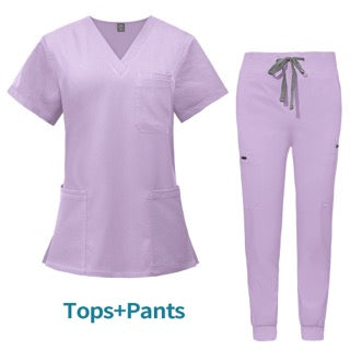 A lavender V-neck scrub top with two pockets and matching jogger-style scrub pants.